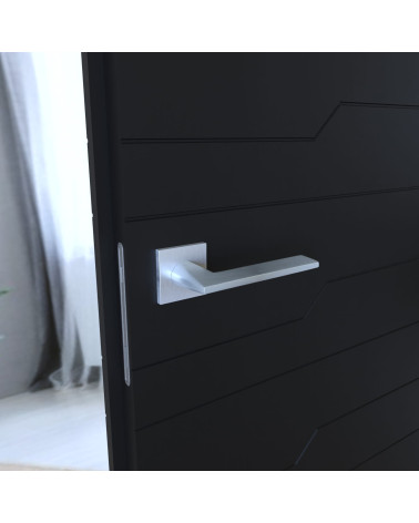 Puxador de porta minimalista ARA design montado numa porta entreaberta