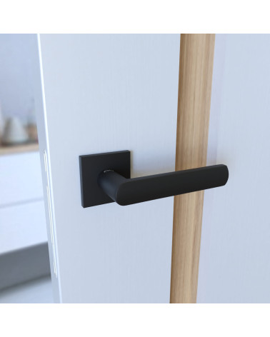 Puxador de porta preto TORINO ferragens design montado numa porta