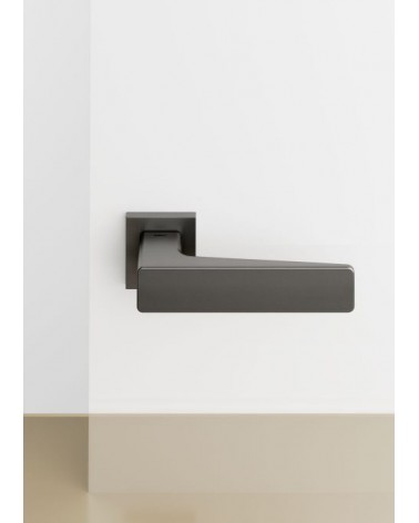 Puxador de porta Mandelli Virgo puxador design cor 3 colocado sobre um fundo