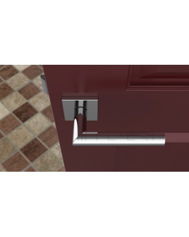 Maçaneta de porta cromada polida ARABIS design vista de cima montada numa porta