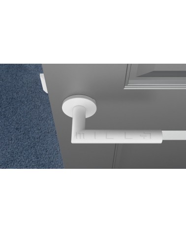 Puxador de porta cor branca ARABIS design vista de cima montado numa porta