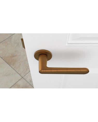 Puxador de porta cobre ARIA puxador design vista de cima montado numa porta