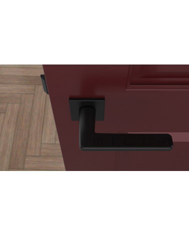 Puxador de porta preto SETIA puxador design visto de cima montado numa porta