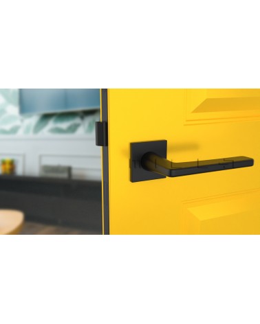 Puxador de porta preto SETIA puxador design visto de frente montado numa porta
