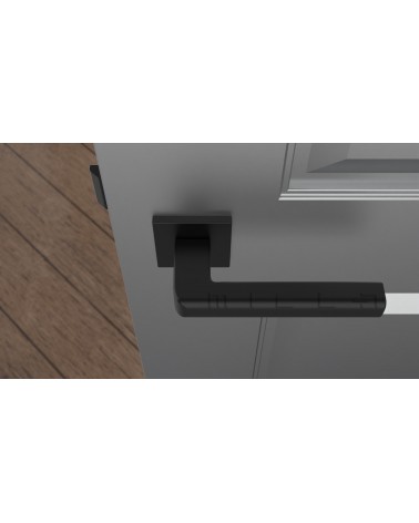 Puxador de porta SALICE preto design de ferragens vista de cima montado numa porta