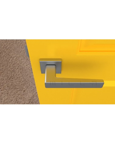 Puxador de porta cromado acetinado ERICA ferragens design vista de cima montado numa porta