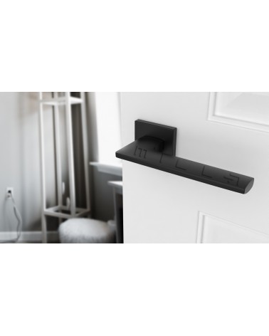 Puxador de porta moderno LUNARIA puxador design vista de cima inclinada montado numa porta