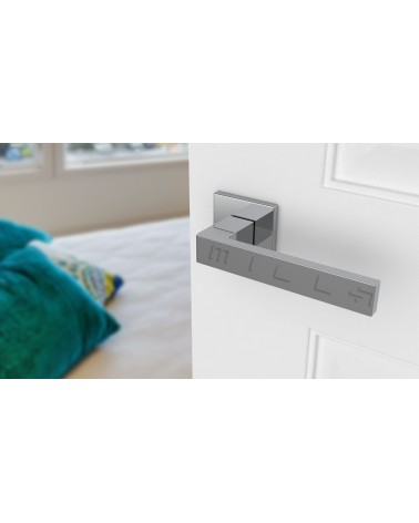 Puxador de porta SULLA puxador design cor 1 vista de cima inclinada montado numa porta