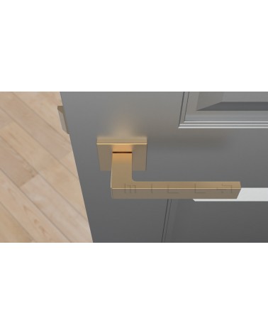 Puxador de porta dourado mate SULLA puxador design vista de cima montado numa porta
