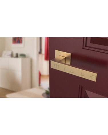 Puxador de porta dourado mate SULLA puxador design vista de cima inclinada montado numa porta