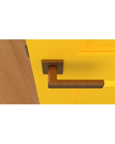 Puxador de porta moderno RAFLESIA puxador design de cor 1 montado numa porta amarela