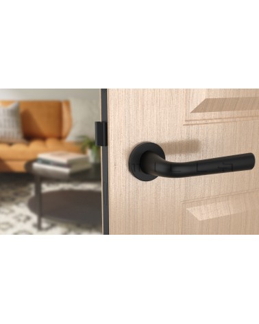Puxador de porta Preto TULIPA porta interior design vista de frente montado numa porta