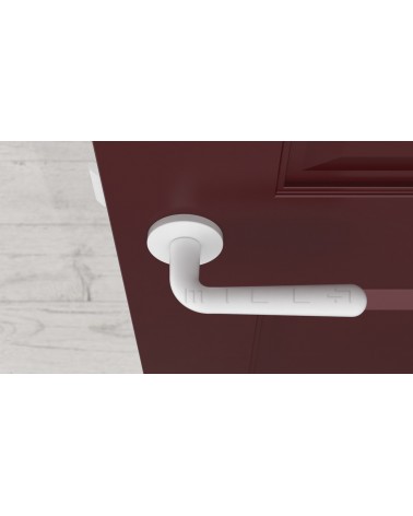 Puxador de porta IRGA design branco mate vista de cima montado numa porta