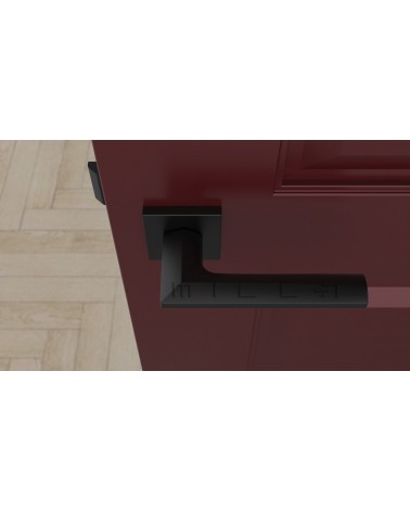 Puxador de porta preto JASMINA puxador design vista de cima montado numa porta