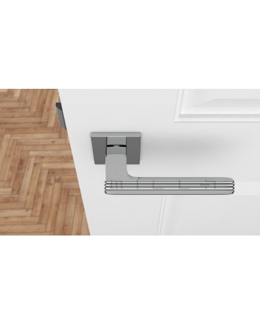 Puxador de porta em cromo polido LARICE design vista de cima montado numa porta