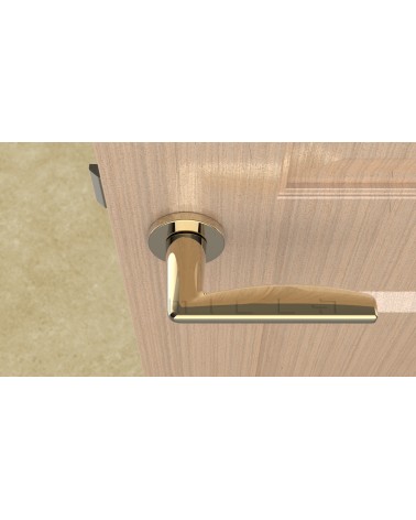 Puxador de porta dourado polido LUNA puxador design vista de cima montado numa porta