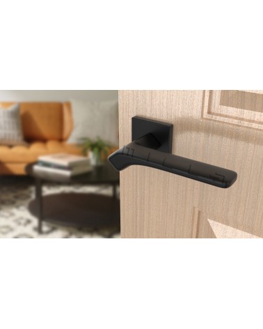 Puxador de porta Contemporâneo BERGERIA puxador design vista de cima inclinada montado numa porta