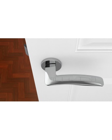Puxador de porta cromo polido ROBINE ferragens design vista de cima montado numa porta