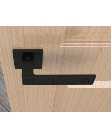 Puxador de porta preto Apollo design vista de cima montado numa porta