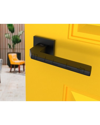 Puxador de porta sóbrio ETNA ferragens design vista inclinada montado numa porta