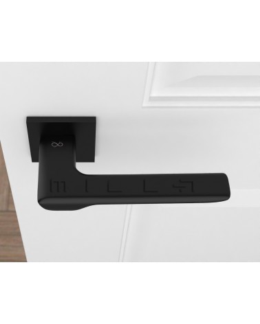 Puxador de porta preto LIGNE design vista de cima montado numa porta