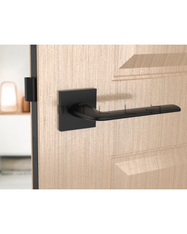 Puxador de porta preto STINGER puxador design vista de frente montado numa porta