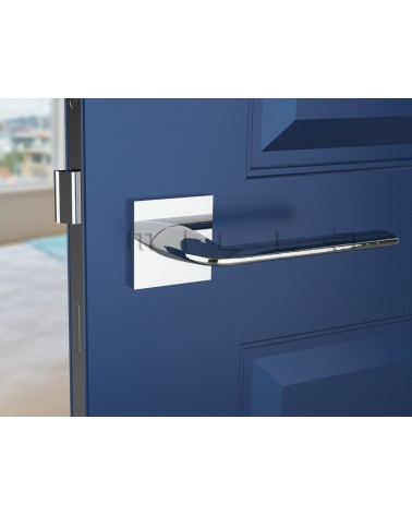 Puxador de porta cromado polido STINGER puxador design vista de frente montado numa porta