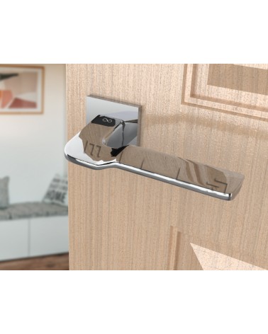 Puxador de porta cromado polido LINE BALI ferragens design vista inclinada montada numa porta