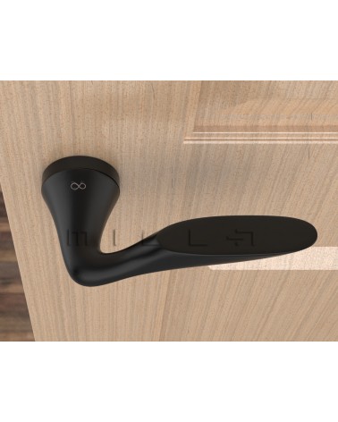 Puxador de porta preto DOUCE puxador design vista de cima montado numa porta