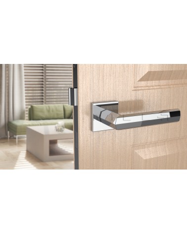 Puxador de porta em zamak FRESIA puxador design cor 2 vista de cima inclinada montado numa porta