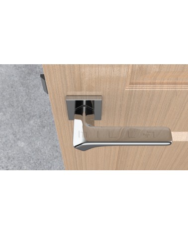 Puxador de porta em zamak BERGERIA puxador design vista de cima montado numa porta
