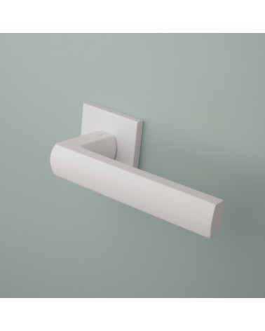 Puxador de porta em zamak HOSTA design montado numa porta