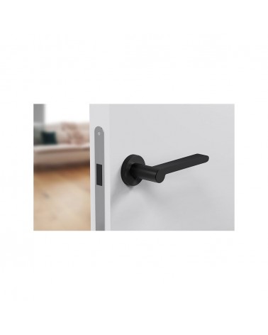 Puxador de porta moderno Pandora puxador design visto de cima montado numa porta entreaberta