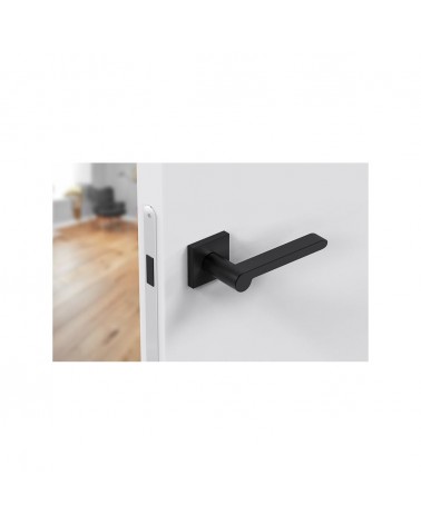 Puxador de porta moderno Pandora puxador design vista de cima inclinada montado numa porta