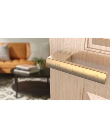 Puxador de porta ouro mate BRISA puxador design montado numa porta entreaberta