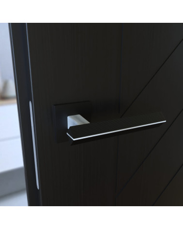Puxador de porta bicolor cromo escovado/preto CARRERA design montado numa porta