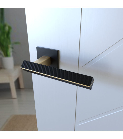 Puxador de porta bicolor ouro mate/preto CARRERA puxador design