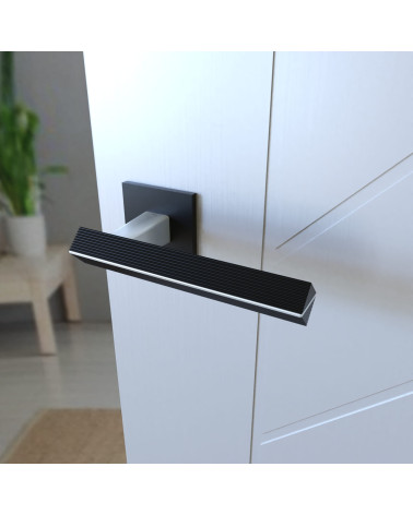 Puxador de porta em zamak CARRERA puxador design cor 1 vista de cima montado numa porta