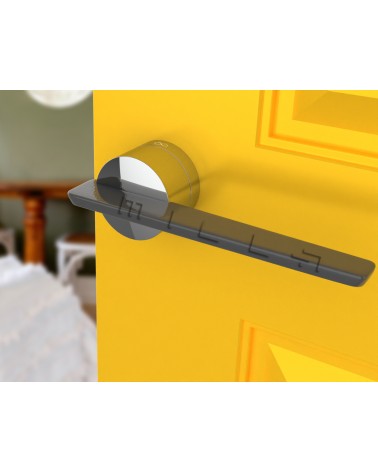 Puxador de porta em zamak JUMELLE design vista inclinada montado numa porta