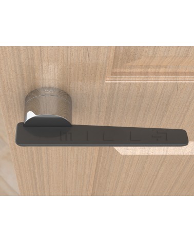 Puxador de porta em zamak JUMELLE design vista de cima montado numa porta