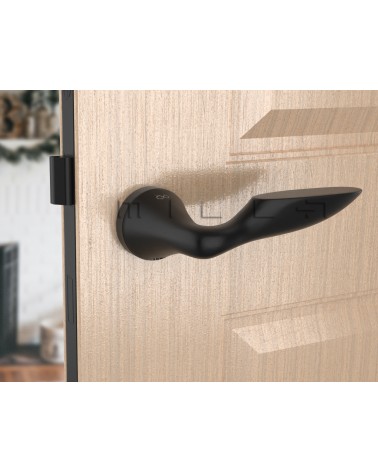 Puxador de porta zamak DOUCE design vista inclinada montado numa porta