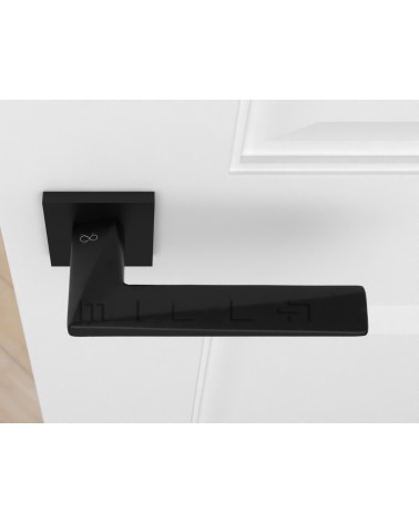 Puxador de porta zamak DIAMANT design cor 1 vista de cima montado numa porta