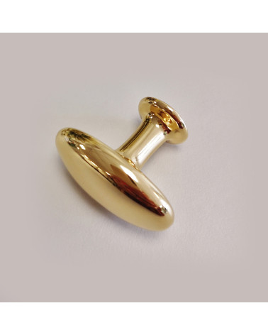 Puxador de móvel ouro polido NAPOLI design vista lateral sobre fundo cinzento