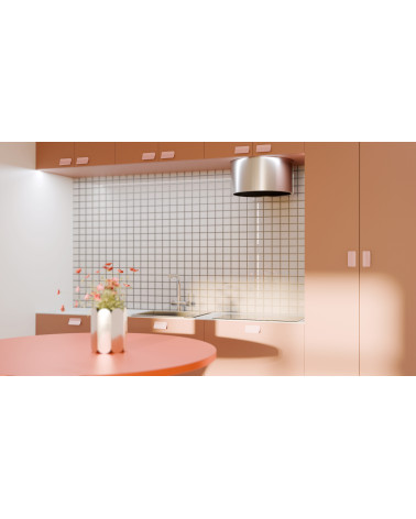 Puxador de móvel rosa poudré SEA puxador design montado num móvel de cozinha