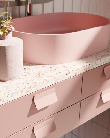 Puxador de móvel rosa poudré SEA puxador design montado num móvel de casa de banho