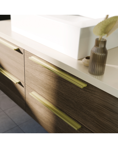Puxador de móvel anodizado dourado ESSEN puxador design vista inclinada montado num móvel